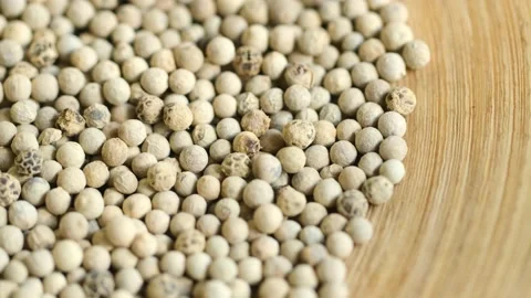 Close-up video of a slowly rotating white pepper Stock Footage 161612685