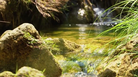 Close up video of small mountain waterfall Stock Footage 153223529