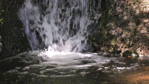 Close-up video of a small waterfall Stock Footage 272583926