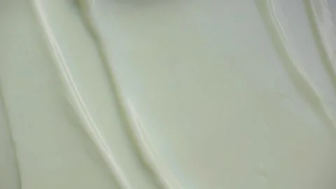 Close-up Video of Spatula Swiping Light Green Facial Cream Texture Vídeo Stock 340851280