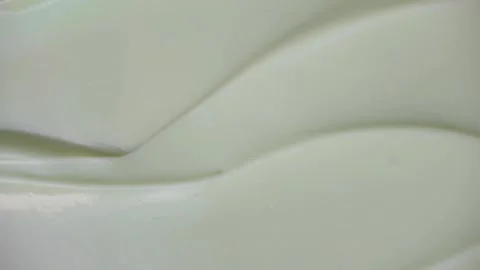 Close-up Video of Spatula Swiping Light Green Skincare Cream Texture Vídeo Stock 340851288
