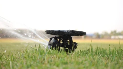 Close up video Springer is spraying water in a green lawn. 스톡 동영상 104737698