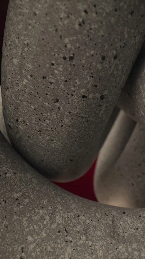 Close up video of stone textured round circles intertwined for eternity, concept Video stock 283983178