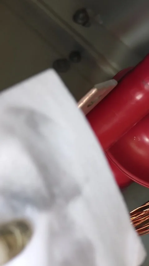 Close up video of a technician hand in white glove using a cloth to wipe. Stock Footage 338355322