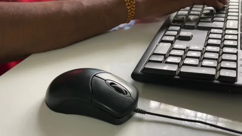 Close up video of typing on computer keyboard and pressing enter key Видео 315019431