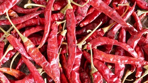 Close-up video of vibrant red dried chilies with an excellent texture Video stock 337287562