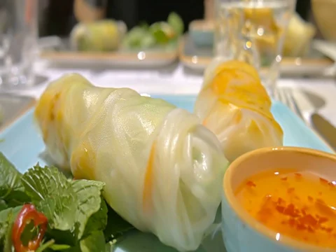 Close-up vietnamese spring rolls nem goi cuon on table in restaurant Stock-Footage 81533365
