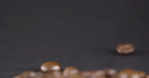 Close Up Viev of Coffee Beans and Ground Coffee Fall. Slow motion. Coffe Product Stock Footage 104623718