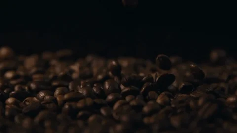 Close Up Viev of Coffee Beans Fall. Slow motion. Coffe Production. Coffee. Stock Footage 90602411