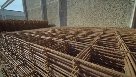 Close-up view about stacked metal rebars aka iron mesh for construction. Stock Footage 297870770