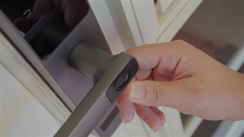 Close-up view of the accepting method of unlocking a smart lock home door with Stock Footage 322090668