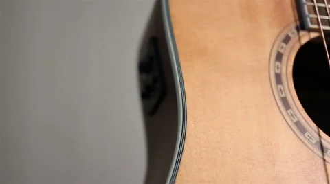 Close up view of acoustic guitar Stock Footage 67876003