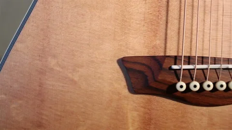 Close up view of acoustic guitar Stock Footage 67876070