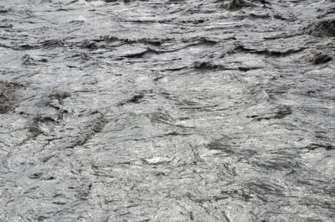 Close view of the affluent mountain nepal river Stock Photos