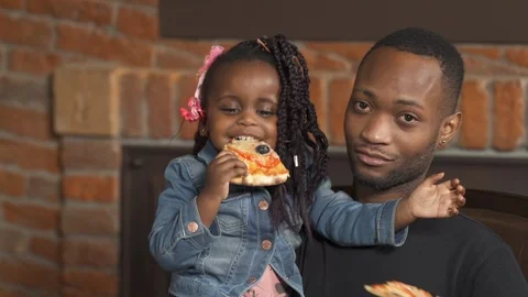 Close-up view of an Afro-American loving father and daughter enjoying their time Stock Footage 122154846