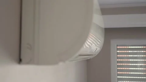 Close up view of air conditioning starts working. Switching on air condioning Stock Footage 202072810