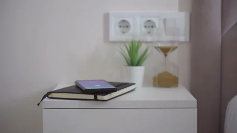 Close-up view of alarm clock on the phone Stock Footage 155979342