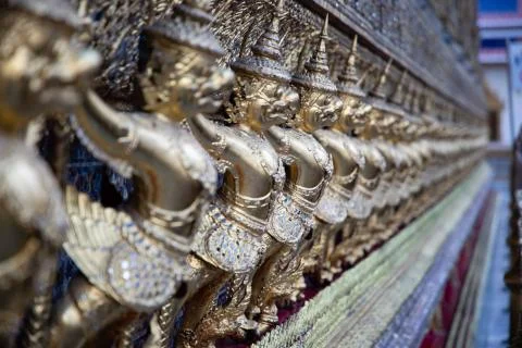 Close view of aligned statues from the Royal temple in Bangkok Stock Photos