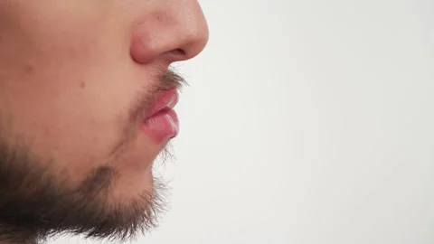 Close up view of alone man mouth with dark brown beard, mustache, big nose Stock-Footage 147570976