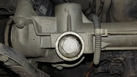 A close-up view of an aluminum car steering rack housing with Stock Footage 343417616