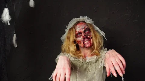 Close up view on amazing professional dead wife zombie bride Halloween makeup on Stock Footage 95879581