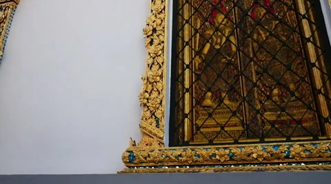 Close-up view of amazing Wat Phra Kaeo temple decoration. Grand Palace Stock Footage 65526161