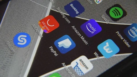 Close-up view of Amazon Music icon app on an Android smartphone, including other Stock Footage 128379172
