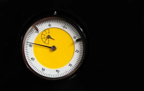 Close-up view of an analog round meter in Industry Stock Photos