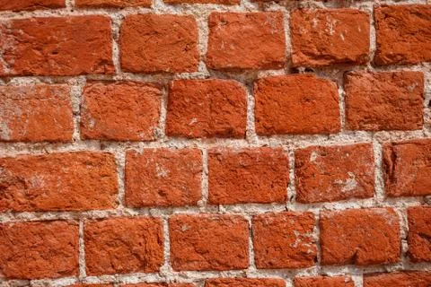 Close up view of ancient brick wall. Red brick background. Stock Photos
