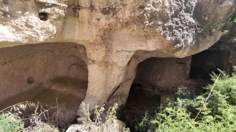 Close-Up View of Ancient Rock-Cut Catacombs, Salina, Naxxar, Malta Stock Footage 339798497