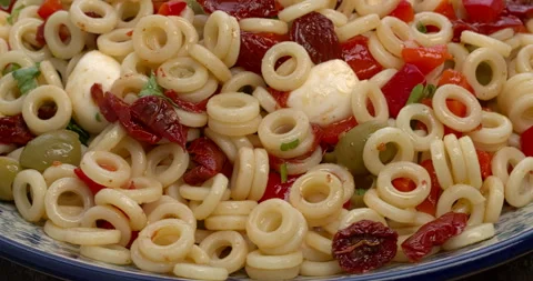 Close-up view of anelli siciliani pasta salad. Stock Footage 299930339