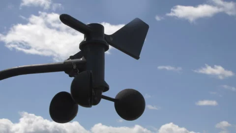 A close-up view of an Anemometer. A blue sky with clouds background 스톡 동영상 295968127