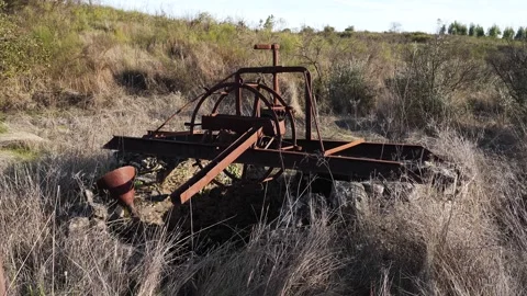 Close up view of an antique agricultural engine, coated in rust, this was built 스톡 동영상 328135373