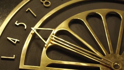 Close up view on Antique bronze dial indicator for the movement of the elevator Stock Footage 293677713