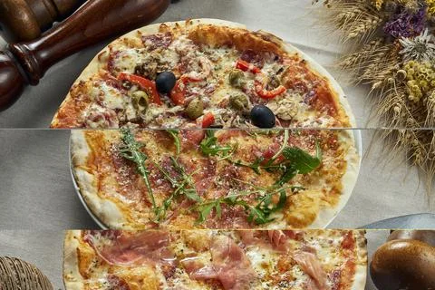 Close up view on Appetizing with melted cheese, smoked sausages, bell peppers Stock Photos