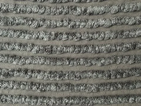 Close up view of ash fluffy doormat. Stock Photos