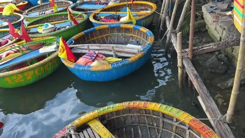 A close-up view of an Asian round basket boat made with bamboo and rattan. The Stock Footage 308308006