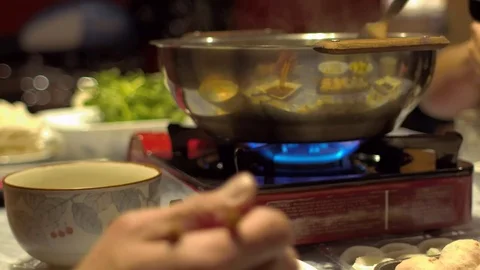 Close up view of a Asian style hot pot dinner Stock Footage 74138798