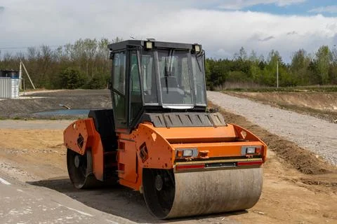 Close up view of an asphalt paver on a construction site during the day wit.. Stock-Fotos