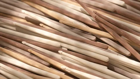 A close-up view of assorted natural wooden sticks, featuring various shades of Video stock 285183620