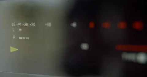 Close up view of audio player display in process. Moving reflection on it`s Stock Footage 131324846