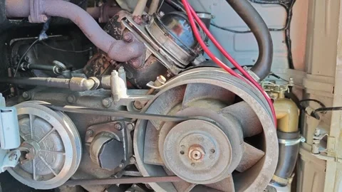 Close-up view of an automotive engine showing detailed components Stock Footage 336480175
