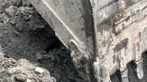 Close up view of Backhoe Heavy Construction Machinery Equipment Digging Stock Footage 241544376