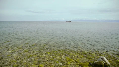 Close up view of Baikal lake. Turquoise water and rocky coast underwater. Stock Footage 80877987