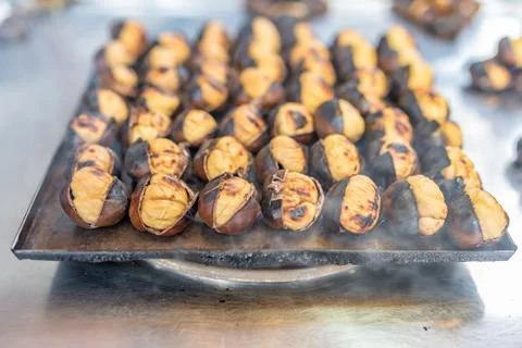 Close up view of baked chestnuts Stock Photos