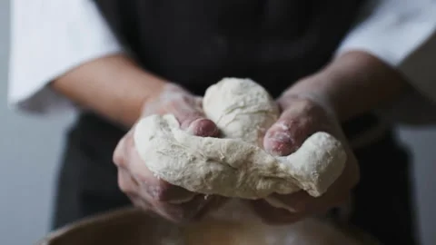 Close up view of baker kneading dough natural pastries bakery food slow mot.. Stock Footage 272566609