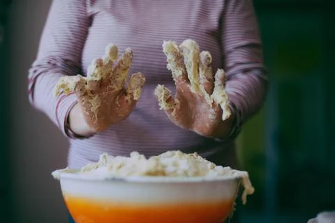Close up view of baker kneading dough. Homemade bread. Hands preparing bread  Stock Photos