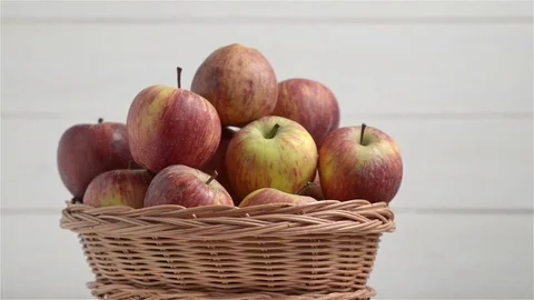Close up view of basket with red apples. rotatory motion Stock Footage 72122903
