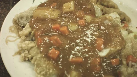 Close up view of bbq curry sauce with pepper small blocks of carrots and  potato Stock-Footage 237251799