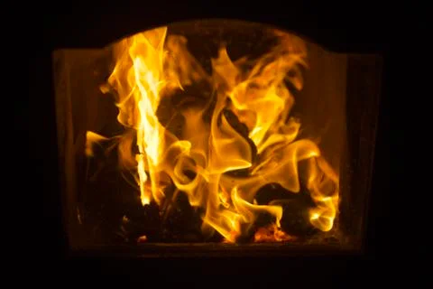 A close-up view of the Beautiful Burning Fire in the home fireplace Foto stock